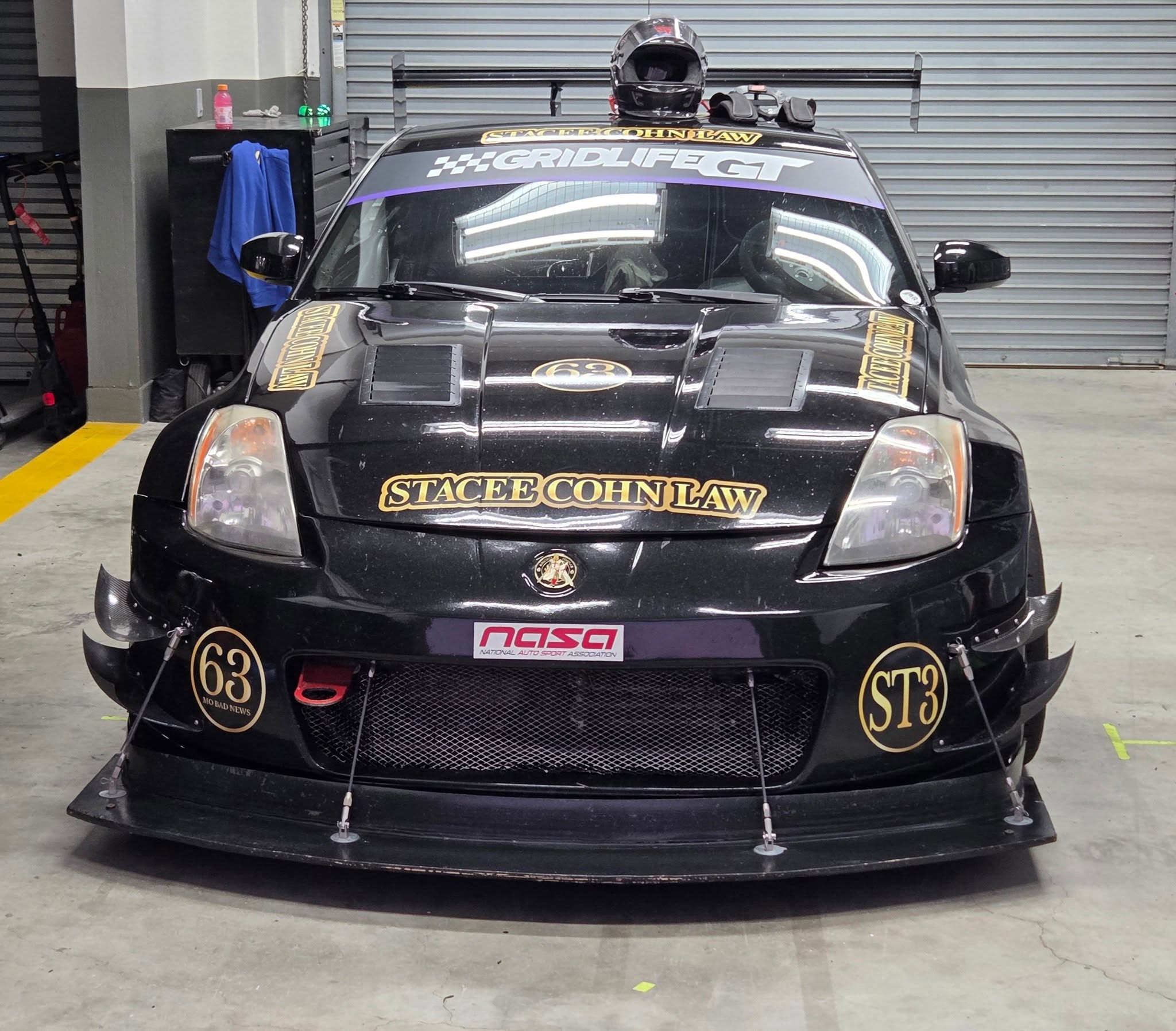 Storm No. 63 front-on in the garage, full Stacee Cohn Law livery