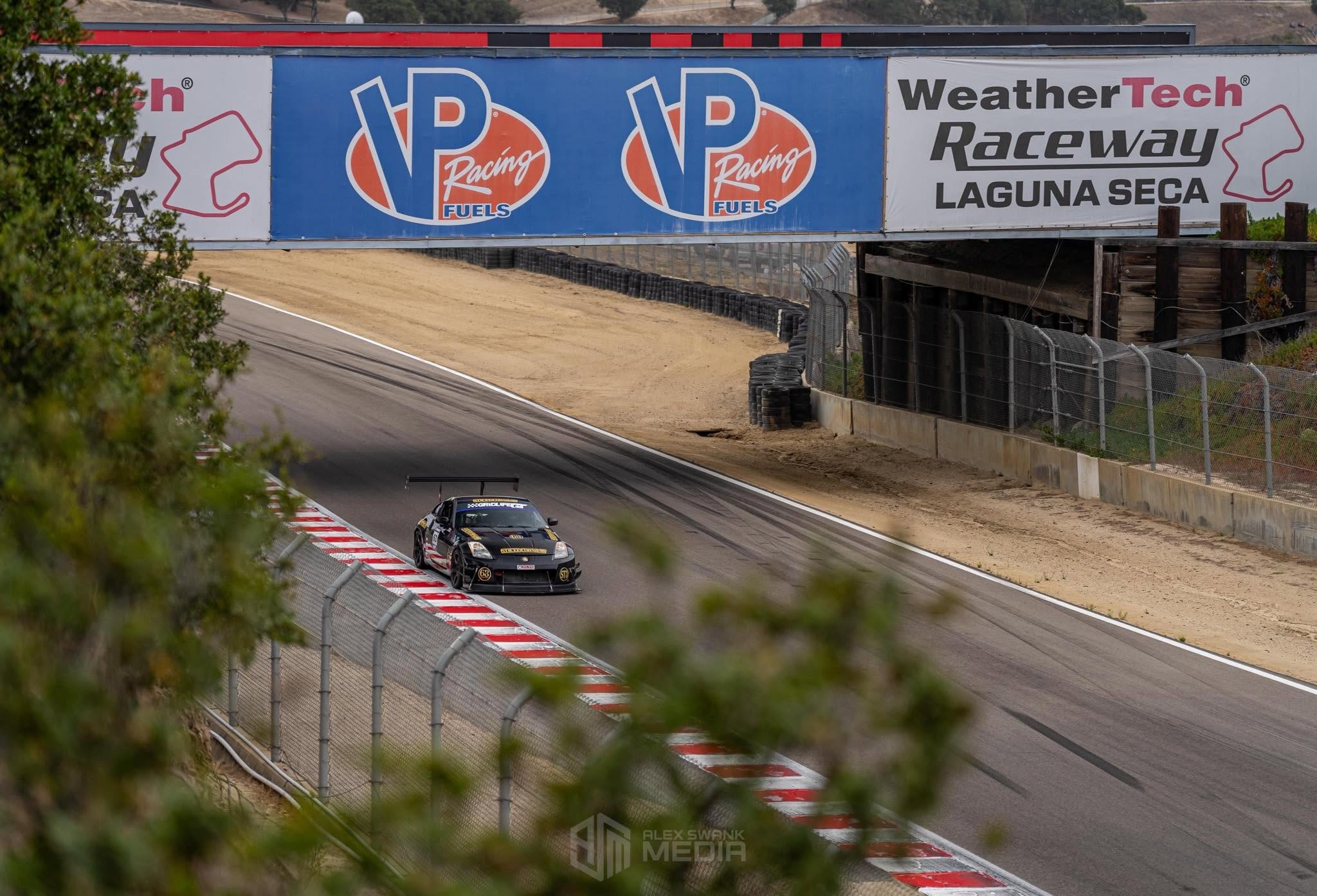 Storm No. 63 at Laguna Seca under the VP Racing bridge